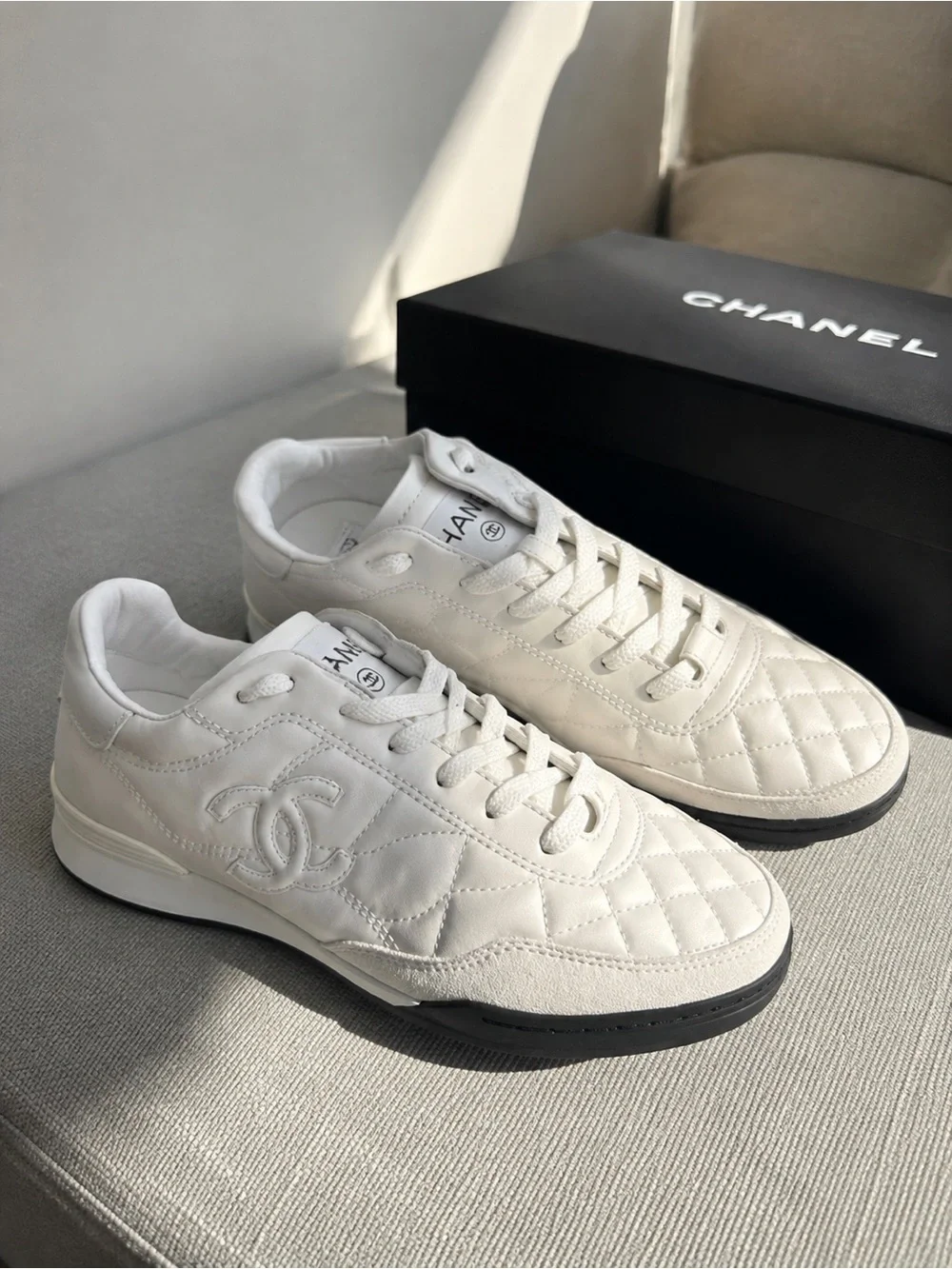 CHANEL White Quilted Leather CC Logo Sneakers - Women's